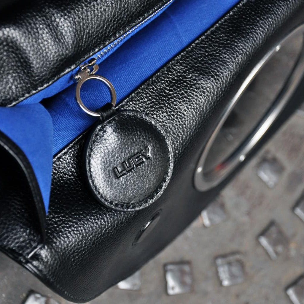 cobalt blue lining, YKK zip and LUCY branded leather medallion keychain